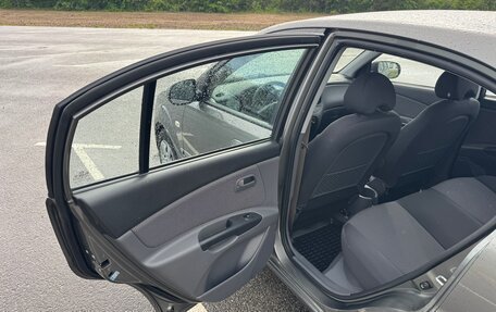 KIA Rio II, 2010 год, 885 000 рублей, 9 фотография