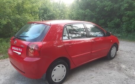 Toyota Corolla, 2005 год, 647 000 рублей, 4 фотография