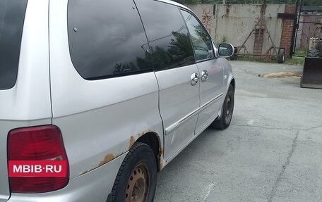KIA Carnival III, 2005 год, 450 000 рублей, 2 фотография