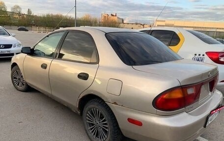 Mazda Protege, 1997 год, 98 000 рублей, 1 фотография