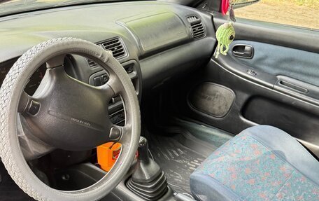 Mazda 323, 1997 год, 200 000 рублей, 8 фотография