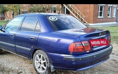 Mitsubishi Carisma I, 2002 год, 185 000 рублей, 16 фотография