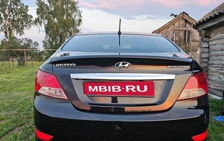 Hyundai Solaris II рестайлинг, 2011 год, 800 000 рублей, 10 фотография