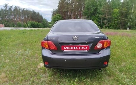Toyota Corolla, 2009 год, 850 000 рублей, 4 фотография