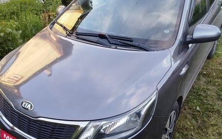 KIA Rio III рестайлинг, 2013 год, 1 000 000 рублей, 18 фотография