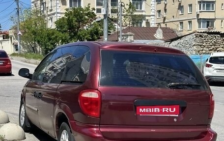 Chrysler Voyager IV, 2001 год, 310 000 рублей, 2 фотография