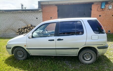 Toyota Raum I, 1998 год, 250 000 рублей, 3 фотография