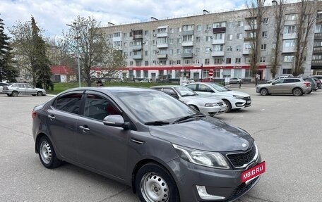 KIA Rio III рестайлинг, 2013 год, 750 000 рублей, 15 фотография