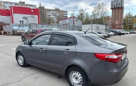 KIA Rio III рестайлинг, 2013 год, 750 000 рублей, 19 фотография