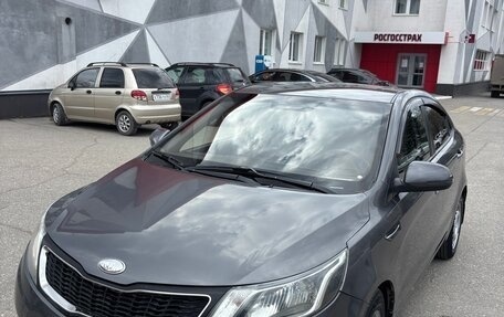 KIA Rio III рестайлинг, 2013 год, 750 000 рублей, 21 фотография