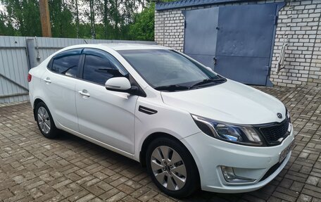 KIA Rio III рестайлинг, 2012 год, 821 000 рублей, 2 фотография