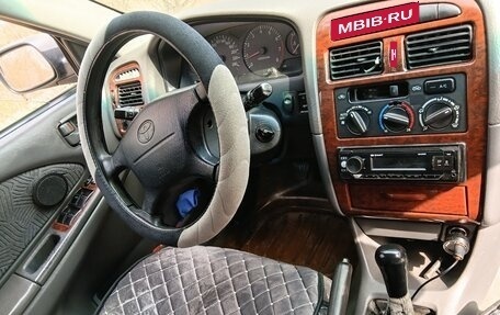 Toyota Avensis III рестайлинг, 1998 год, 125 000 рублей, 1 фотография
