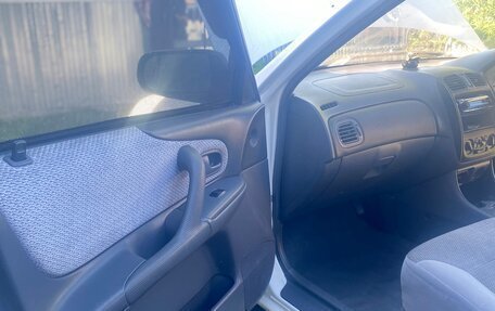 Mazda Familia, 1998 год, 340 000 рублей, 22 фотография