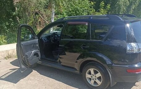 Mitsubishi Outlander III рестайлинг 3, 2011 год, 1 050 000 рублей, 4 фотография