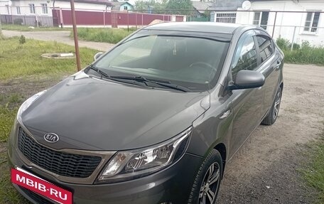 KIA Rio III рестайлинг, 2012 год, 850 000 рублей, 7 фотография
