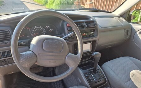 Chevrolet Tracker II, 2001 год, 670 000 рублей, 10 фотография