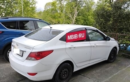 Hyundai Solaris II рестайлинг, 2011 год, 450 000 рублей, 3 фотография