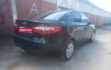 KIA Rio III рестайлинг, 2013 год, 695 000 рублей, 3 фотография