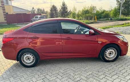 Hyundai Solaris II рестайлинг, 2011 год, 699 000 рублей, 4 фотография