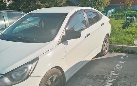 Hyundai Solaris II рестайлинг, 2012 год, 700 000 рублей, 2 фотография