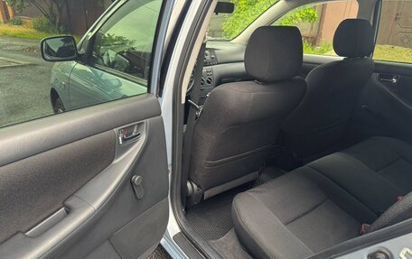Toyota Corolla, 2004 год, 670 000 рублей, 11 фотография
