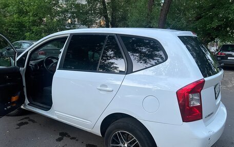 KIA Carens III (RP), 2011 год, 599 000 рублей, 3 фотография
