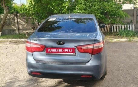 KIA Rio III рестайлинг, 2013 год, 850 000 рублей, 3 фотография