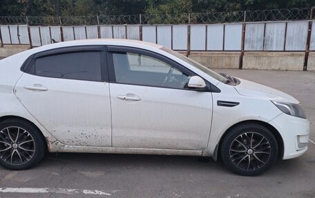 KIA Rio III рестайлинг, 2012 год, 630 000 рублей, 3 фотография