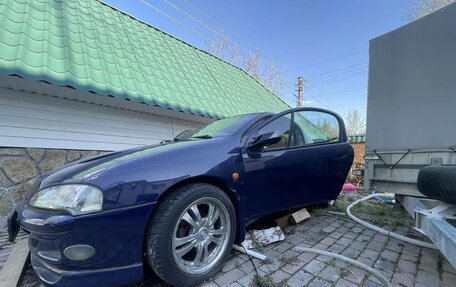 Opel Tigra, 1995 год, 430 000 рублей, 3 фотография