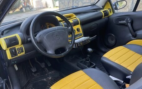 Opel Tigra, 1995 год, 430 000 рублей, 18 фотография