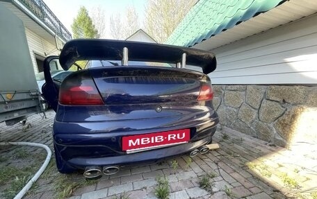 Opel Tigra, 1995 год, 430 000 рублей, 9 фотография
