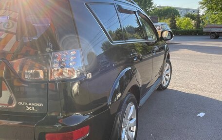 Mitsubishi Outlander III рестайлинг 3, 2011 год, 1 100 000 рублей, 4 фотография