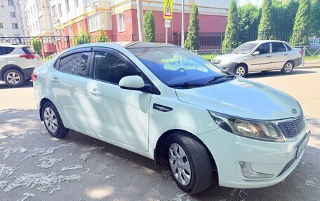 KIA Rio III рестайлинг, 2012 год, 695 000 рублей, 2 фотография