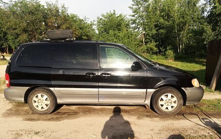 KIA Sedona II рестайлинг, 2003 год, 600 000 рублей, 11 фотография