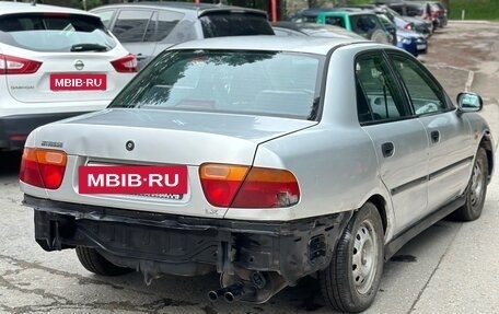 Mitsubishi Carisma I, 1998 год, 75 000 рублей, 2 фотография