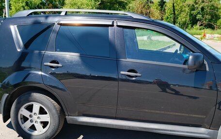 Mitsubishi Outlander III рестайлинг 3, 2011 год, 1 050 000 рублей, 2 фотография