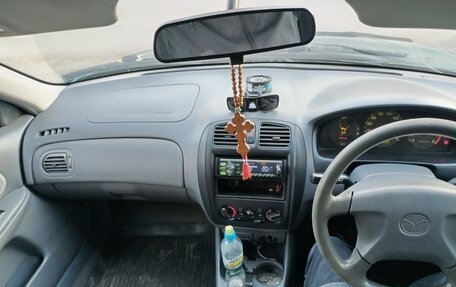 Mazda Familia Y10, 1998 год, 320 000 рублей, 3 фотография