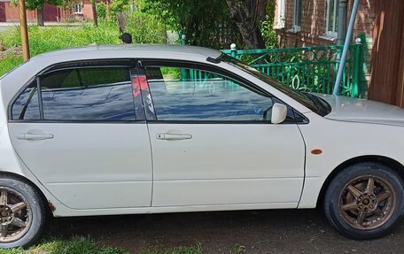 Mitsubishi Lancer IX, 2001 год, 310 000 рублей, 23 фотография
