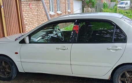 Mitsubishi Lancer IX, 2001 год, 310 000 рублей, 24 фотография
