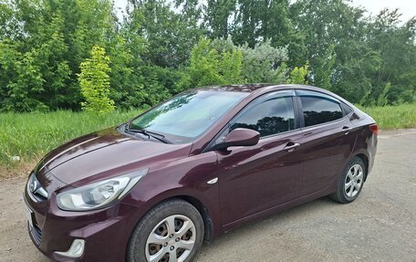 Hyundai Solaris II рестайлинг, 2012 год, 630 000 рублей, 3 фотография