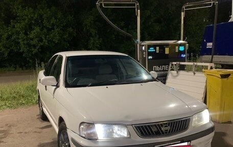 Nissan Sunny B15, 2000 год, 12 фотография