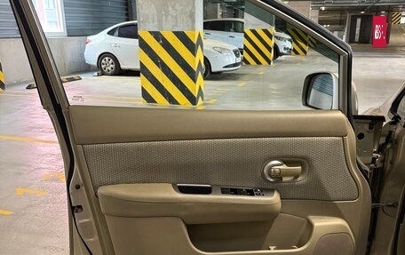 Nissan Tiida, 2010 год, 770 000 рублей, 9 фотография
