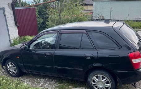 Mazda 323, 1999 год, 300 000 рублей, 3 фотография