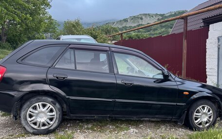 Mazda 323, 1999 год, 300 000 рублей, 2 фотография