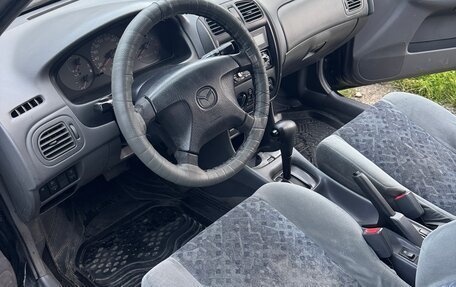 Mazda 323, 1999 год, 300 000 рублей, 5 фотография