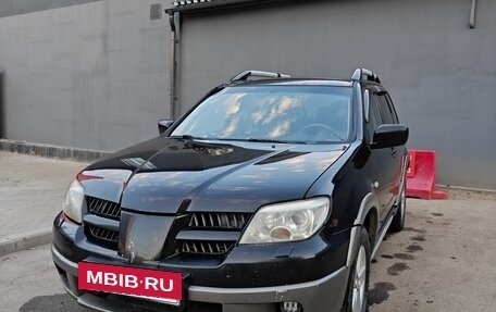 Mitsubishi Outlander III рестайлинг 3, 2004 год, 610 000 рублей, 3 фотография