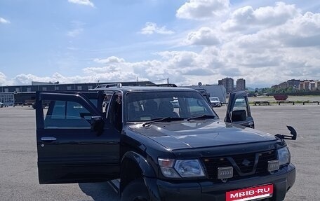 Nissan Safari IV, 2000 год, 1 850 000 рублей, 11 фотография
