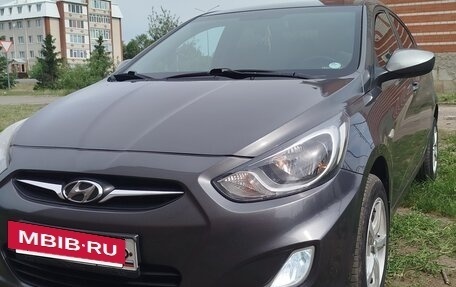 Hyundai Solaris II рестайлинг, 2011 год, 650 000 рублей, 2 фотография