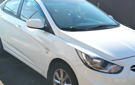 Hyundai Solaris II рестайлинг, 2011 год, 730 000 рублей, 17 фотография