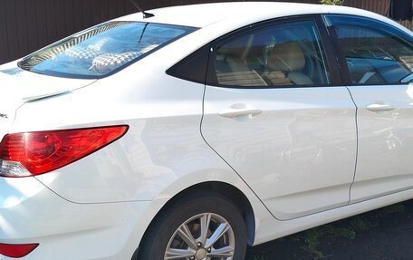 Hyundai Solaris II рестайлинг, 2011 год, 730 000 рублей, 18 фотография